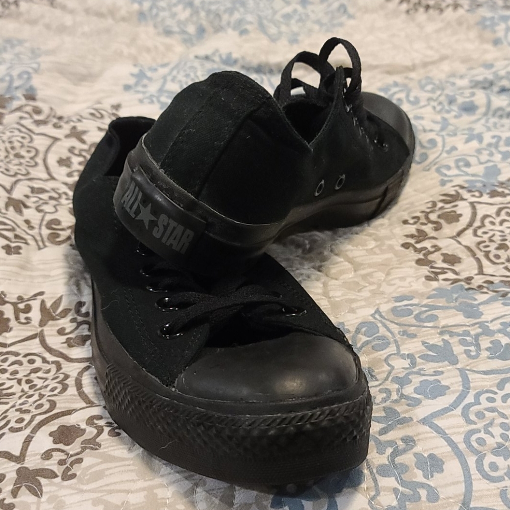 Chuck Taylor's all black